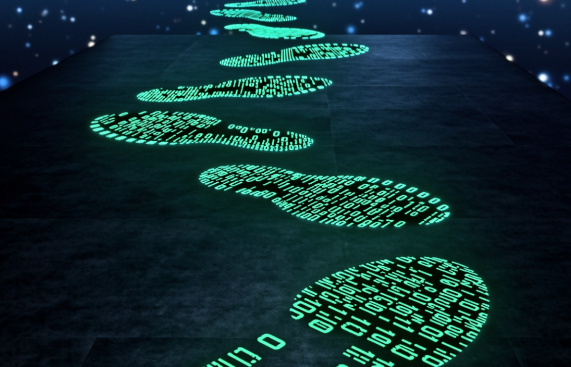 Abstract footprints made of glowing binary code on a dark floor